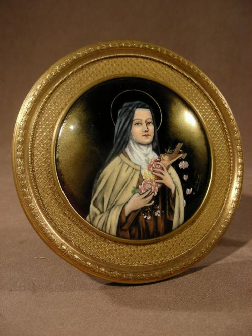 Charming and rare enamelled St Therese of Lisieux.